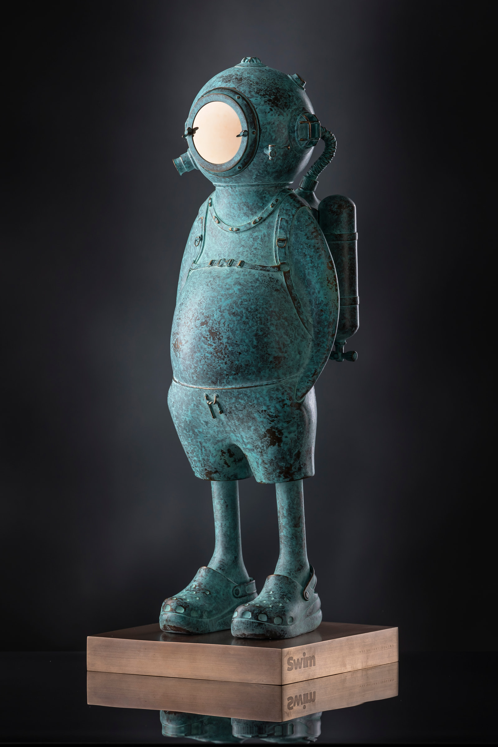 Swim — bronze sculpture with green patina by Max Sheika